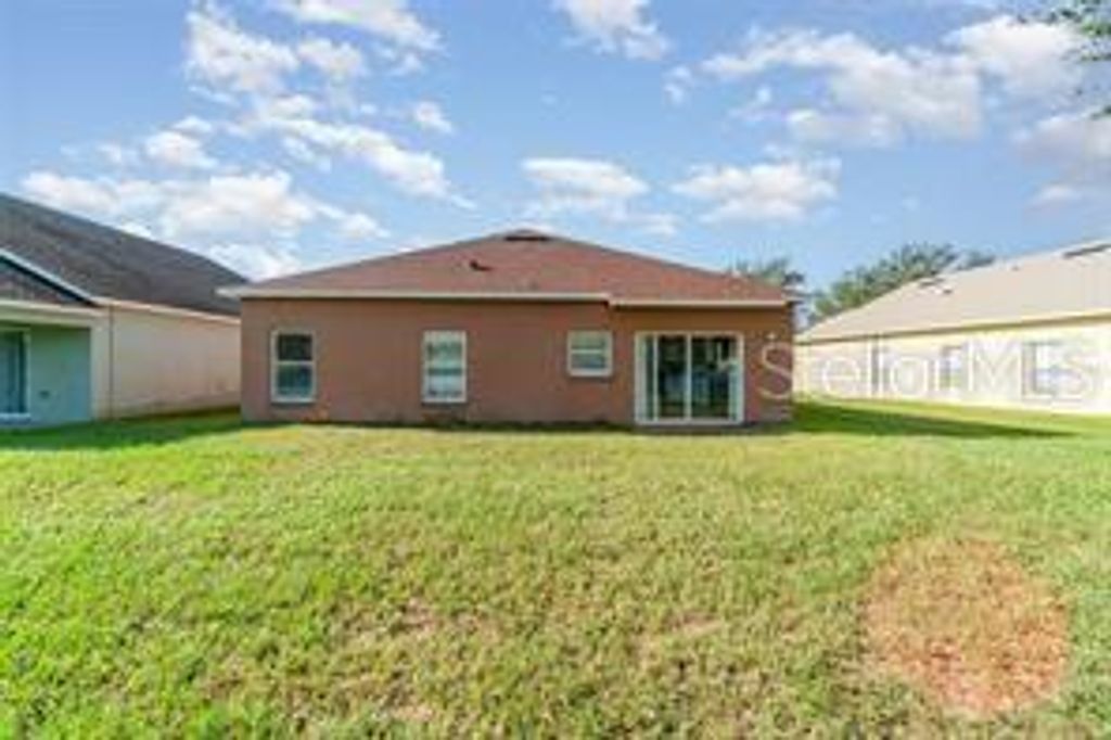 Photo of 3145 Dasha Palm Drive, Kissimmee, FL 34744 (MLS # O6378931)