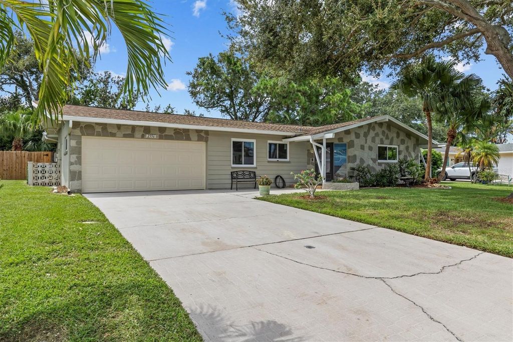 Photo of 2356 Mangrum Drive, Dunedin, FL 34698 (MLS # TB8424912)
