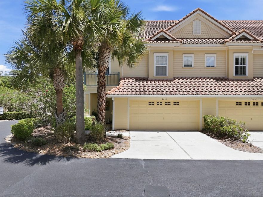 Welcome to this beautifully maintained 4-bedroom, 2.5-bathroom end-unit townhome in Palm Harbor offering spacious three-story living, thoughtful upgrades, and an unbeatable location near top-rated schools, parks, dining, and golf courses. With a two car garage, a 2022 roof covered by the HOA, a 2026 water heater, and a 2026 water softener and reverse osmosis system, this home combines comfort and peace of mind. Step inside through the welcoming foyer entrance to the open-concept first floor featuring crown molding and a seamless kitchen, dining, and living room layout designed for both everyday living and entertaining. The kitchen showcases beautiful cabinetry, stainless steel appliances, and easy flow into the main living spaces. Just beyond the living area, sliding doors lead to a private pavered patio perfect for grilling, outdoor dining, or relaxing in the Florida sunshine. The half bathroom is also conveniently located on the first floor.  The second floor features two nicely sized guest bedrooms connected by a shared full bathroom with access from one of the bedrooms. Also located on this level is the spacious primary suite offering a cozy fireplace, large walk-in closet, and private balcony access for your own peaceful retreat. The luxurious en suite bathroom includes a glass-enclosed shower, separate soaking tub, dual-sink vanity, and private water closet. The top floor offers a large, private bedroom. Conveniently located near top-rated zoned schools, abundant dining and shopping options, golf courses, and John Chesnut Sr. Park, this townhome offers the perfect blend of space, style, and location in the heart of Palm Harbor. Schedule your showing today!