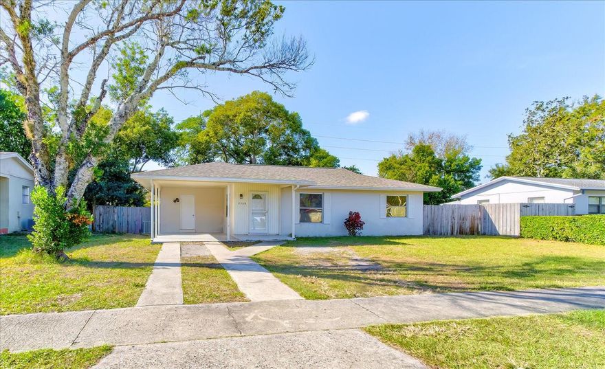 Welcome to this move-in ready 2-bed, 2-bath home in Deltona Lakes, offering 1,010 sqft of functional living space on a generous, fully fenced lot with NO HOA. Major updates are already taken care of with a 2022 ROOF and 2019 HVAC.  Inside, you’ll find tile flooring throughout, an eating space in the kitchen, ceiling fans, a natural gas stove and water heater, plus an INTERIOR Laundry and utility room. A screened-in back porch and carport add everyday convenience. The home’s solid structure, newer systems, and practical layout make it an excellent choice for first-time buyers looking to build equity or investors seeking a clean value-add opportunity in a high-demand area. Close proximity to schools, parks, and shopping. Schedule your private showing today!