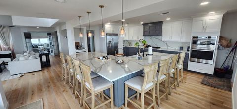 Photo of 511 Porpoise Point Drive, St. Augustine, FL 32084 (MLS # W7884147)