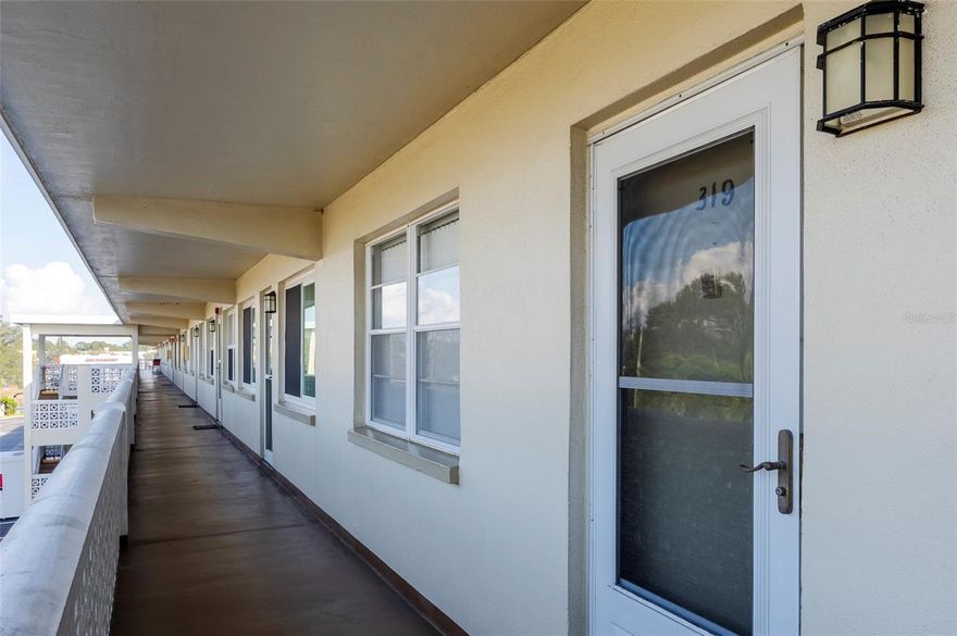 Welcome home to this  light & bright 2 bedroom, 1 bath 3rd floor unit. Within walking distance to Gateway Plaza shopping Center (Publix, Target,CVS restaurants & banks), it offers easy access to I-275, all within 30 minutes or less to Tampa, downtown St Pete,and the beaches. A special feature  
is the large enclosed Florida room with screened windows overlooking the Clubhouse, pool and courtyard. The roof is 3 1/2 years old, HVAC is 2024  and the softwater heater in new in 2025.   The kitchen features a Whirlpool refrigerator and range, plenty of cabinets providing great storage and room for a small kitchen table.  The two spacious bedrooms include two double closets, plus a linen & storage closet in the hallway and another large storage closest in the Florida room. The bath has a walk in tile shower with folding shower seat and new shower head.  The sink, medicine chest and lighting in and bath are new. This vibrant 55+ community includes a Clubhouse currently being updated and will provide a comfortable space for future social events. The pool is heated and there are shuffle board courts for additional entertainment. Assigned parking #319 is at the west end of the building and easy access to the elevator. There are laundry facilities on each floor and a special treat is the outdoor patio space at the west end with comfortable chairs and tables to enjoy your morning coffee or afternoon cocktail.The Milestone Inspection has been completed with no further work required.  A great opportunity to enjoy Florida living.