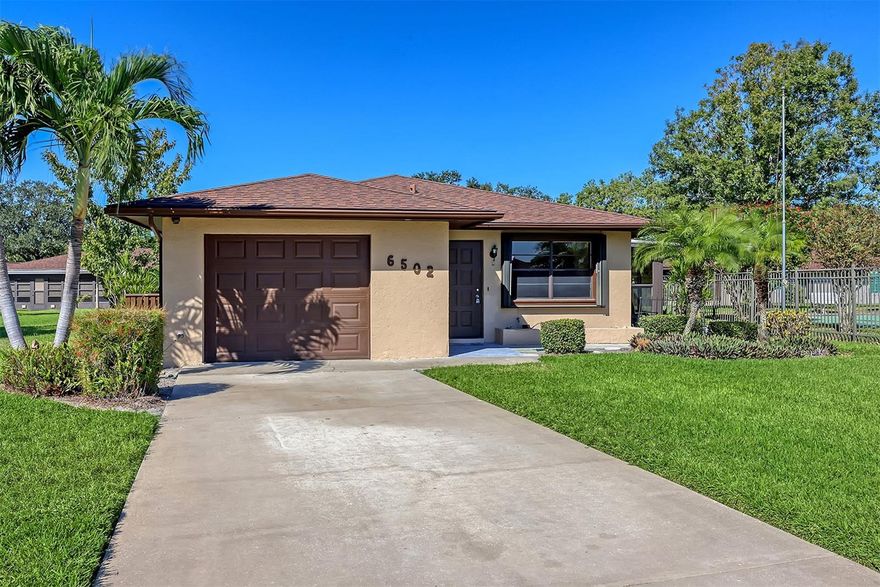 Welcome to Cambridge Village West—a beloved, pet-friendly 55+ community in the heart of Bradenton! This charming single-family home sits on a beautiful lot just steps from the community clubhouse, sparkling heated pool, and a variety of social activities—everything you need for the perfect Florida lifestyle right next door.  Light and comfort greet you the moment you walk in. The entire home has been refreshed in 2025 with new interior paint, updated lighting and fixtures, ceiling fans, bathroom flooring and vanities, plus new carpet in the bedrooms and the enclosed lanai. The kitchen shines with new quartz counters and a subway tile backsplash. Major updates bring peace of mind: 4-point inspection (Oct. 2025), A/C (2024), water heater (2023), and roof (2015).  This ideal 2-bedroom, 2-bath layout feels bright, spacious, and move-in ready—just bring your personal touches and make it your own slice of paradise!Cambridge Village West is known for its friendly neighbors and active lifestyle. Enjoy planned gatherings, updated clubhouse with kitchen and library, shuffleboard court, BBQ area, and beautifully maintained grounds year-round. All of this—and only 5 miles to the sandy beaches of Anna Maria Island! Spend your days watching Gulf sunsets, exploring tiki bars and beach boutiques, or hopping on the free island trolley.  Convenience is unmatched with Blake Hospital, GT Bray Park, YMCA, IMG Academy, restaurants, marinas, golf, entertainment, and both downtown Sarasota and Bradenton’s Riverwalk nearby. Easy access to SRQ Airport and I-75 makes travel a breeze when friends and family come to visit.  Low monthly fee of only $275 includes cable, WiFi, landscaping, exterior paint, pool, and recreation amenities—affordable living with incredible value! Don’t miss this opportunity to own a refreshed Florida home in one of Bradenton’s favorite 55+ communities. The sunshine and coastal lifestyle are calling—come make it yours!