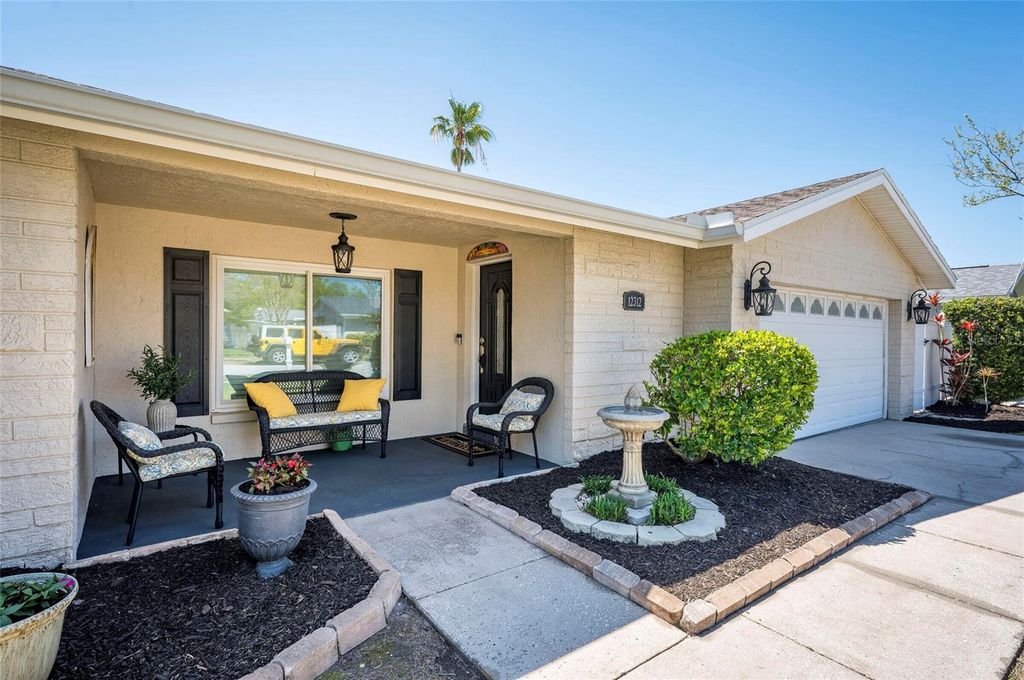 Photo of 12312 89th Terrace, Seminole, FL 33772 (MLS # O6394495)