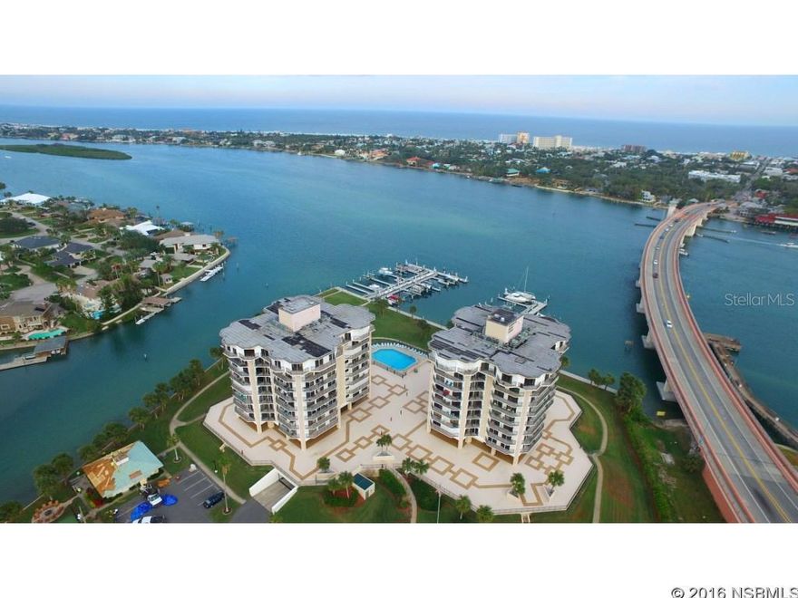 New Smyrna's Premier Riverfront Condominium - Diamond Head Point. A uniquely designed, constructed & located condominium residence located on the west bank of the Intracoastal Waterway, within easy walking distance to eclectic Flagler Avenue & the beach. Well-maintained, the complex has been refurbished in recent years & just finished a million dollar marina project. Dock space is available for lease. This poured-concrete complex comprised of twin towers, is home to unit 104, delivering uncompromised waterfront views from stack # 4, a much sought after & seldom available location, with its views of the river, overlooking the pool. Enjoying impressive waterfront views from its 30 ft elevation above grade, this 1st floor unit combines great views with the convenience & peace of mind of having easy access to the parking garage & ground floor entry plaza by the stairs, if desired. Entry to your unit is by way of the wide, enclosed & air-conditioned hallway that most condominiums don't offer. The gated 5-acre campus offers a secure environment with secured underground garage & keyed entry to building. This Unit Comes With 2 PARKING SPACES, both enjoying locations that are bordered by another car on only one side. Kayaks & bike storage is available, as well as your private storage bay & workshop for those missing their garage work bench & tools. The elegant clubhouse features 2 spas, kitchen & cooking facilities, waterfront fire pit to sit around & tennis & pickleball court. For those with 4-legged children, you will appreciate the spacious, enclosed doggie park (as long as they don't exceed 20 lbs). This partially updated unit features new appliances, updated kitchen with white cabinets & new ceramic back splash, carpet & wood flooring. Guest bedroom features Q Murphy bed for your guests, as well as built-in home office. Master en-suite bathroom has enlarged shower stall & twin sinks. Well-maintained & ready for new owners. Roll-Down Shutters & wind-rated sliders. ;LocationDescription: Condo ;Water: City
