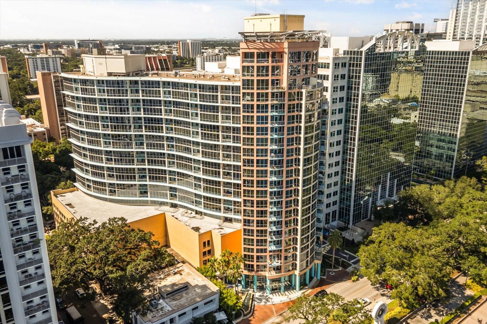 Move in ready now. Welcome to The Waverly on Lake Eola, where downtown Orlando living meets comfort and convenience. This updated two-bedroom, two-bath condo places you directly across from Lake Eola and steps from everything the city has to offer. Inside, an open-concept layout features warm laminate flooring, abundant natural light, and seamless flow to your private balcony—perfect for morning coffee or evening relaxation.
The primary suite offers a walk-in closet and a spa-inspired bath with large-format tile and a deep soaking tub. A second bedroom and full bath provide flexibility for guests or a home office. Enjoy the ease of one assigned parking space, full-time concierge service, and a well-equipped fitness center right within the building.
Just outside your door, Publix, Foxtail Coffee, local cafés, boutiques, and vibrant dining spots surround you, making city life effortless. Schedule your tour today and experience the energy and convenience of downtown living at The Waverly.