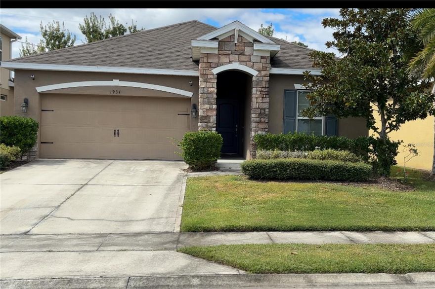 EXCITING Opportunity! $5000 CONCESSION TOWARDS CLOSING COSTS. Welcome to a stunning single-story retreat in the heart of Shingle Creek Reserve at The Oaks community. This beautifully designed 3-bedroom, 2-bathroom home is a haven for families and entertainers alike, offering a blend of elegance, comfort, and convenience. With its unique features, including a spacious foyer, an open concept living area, and a chef's kitchen, this property stands out as a gem in the Central Florida real estate market. The grand foyer, the generously sized living area, and the chef's kitchen are just a few of the unique features that set this property apart. The space unfolds into a generously sized, open concept living area, where light cascades through the windows, illuminating the space with natural light. This seamless flow invites you to experience a harmonious blend of comfort, making it the perfect place for both relaxation and entertaining. The living room, dining room, and kitchen create the ideal space for everyday living and entertaining. The kitchen is a true chef's delight, featuring stainless steel appliances, abundant cabinetry, a spacious pantry, and a center island with additional seating ideal for culinary creations and lively gatherings. The primary suite, thoughtfully located at the rear of the home, is a private oasis with a generous bathroom complete with double vanity sinks, a stand-alone shower, and a private owner's "throne". At the front of the home, two additional guest bedrooms and a full bathroom with a convenient tub/shower combo offer comfort and privacy for family and guests. Step through the sliding glass doors off the dining area to an open porch overlooking the serene backyard, perfect for outdoor dining or unwinding after a long day. The backyard invites meditation as you gaze at the tranquil views from your home. Additional highlights include a well-equipped laundry room with upper shelves, a built-in desk with upper cabinets, and a 2-car garage for added storage and convenience. Nestled in a secure and private community, this home offers a resort-style lifestyle with exceptional amenities, including a playground, tennis courts, a basketball court, scenic walking trails, and a boat ramp for exploring nearby lakes. Enjoy a round of golf at The Oaks Golf Course or take a short drive to theme parks like Walt Disney World and Universal Studios. And when you're ready for a beach day, the beautiful shores of Cocoa Beach, Tampa, Saint Petersburg, and Clearwater are just a hop, skip, and a jump away, promising sun-soaked fun and relaxation. With easy access to schools, shopping, restaurants, and major thoroughfares, this prime location offers unparalleled convenience and peace of mind. Enjoy your newly painted home, complete with an exclusive warranty on all appliances, air conditioning, and water heater. This ensures you can move in and start enjoying your new home with complete peace of mind. Don't miss out on this exceptional home that perfectly blends tranquility with access to the best of Central Florida. This is a unique opportunity to own a property in a secure and private community with resort-style amenities. Schedule your private tour today and discover why you'll love calling 1934 Commander Way your new home.
