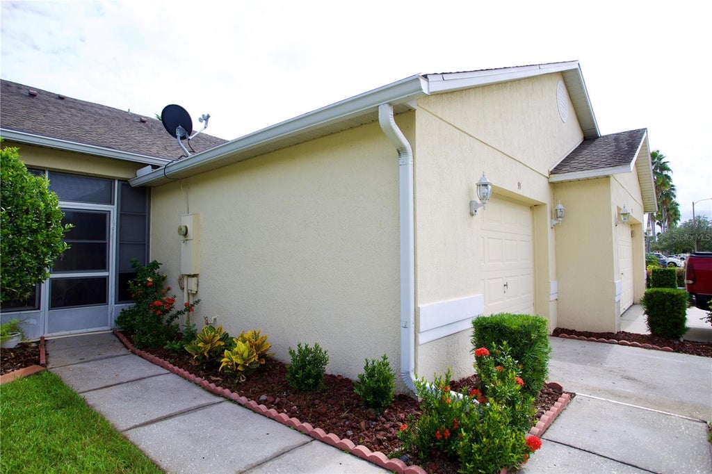 Photo of 91 Club Villas Lane, Kissimmee, FL 34744 (MLS # S5158156)