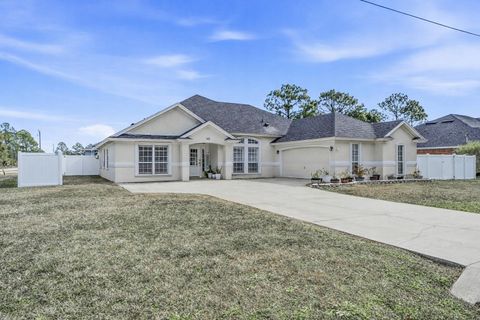 Photo of 143 Sea Trail, Palm Coast, FL 32164 (MLS # FC315613)