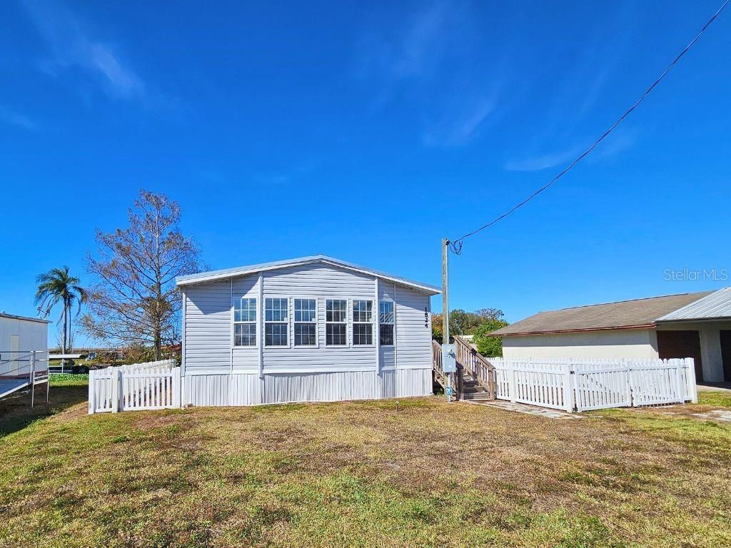 Photo of 1824 Riverside Drive, Moore Haven, FL 33471 (MLS # S5142189)