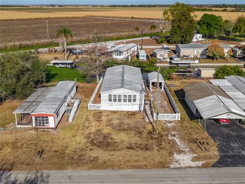 Photo of 1824 Riverside Drive, Moore Haven, FL 33471 (MLS # S5142189)