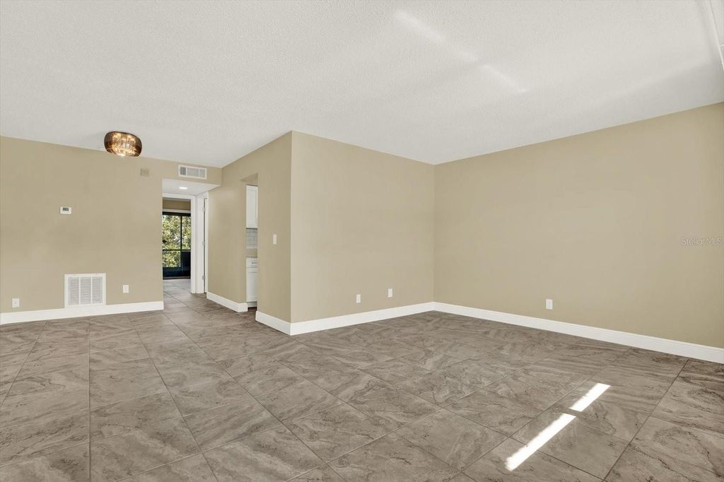 Photo of 9125 Tudor Drive #D109, Tampa, FL 33615 (MLS # TB8471158)