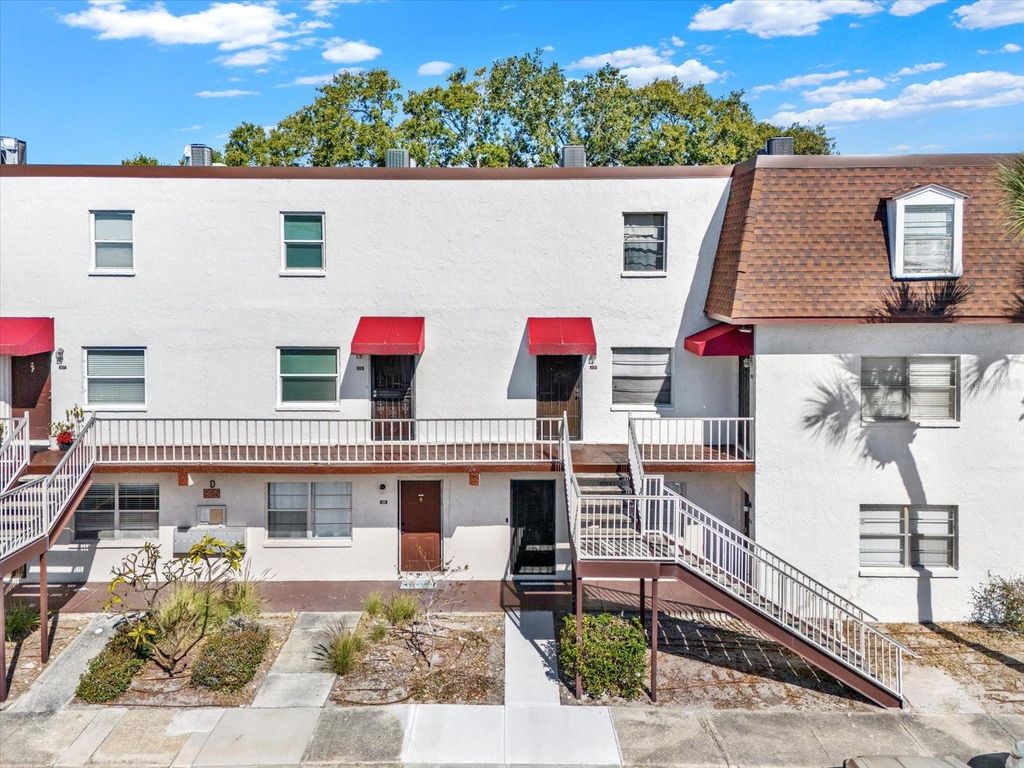 Photo of 9125 Tudor Drive #D109, Tampa, FL 33615 (MLS # TB8471158)