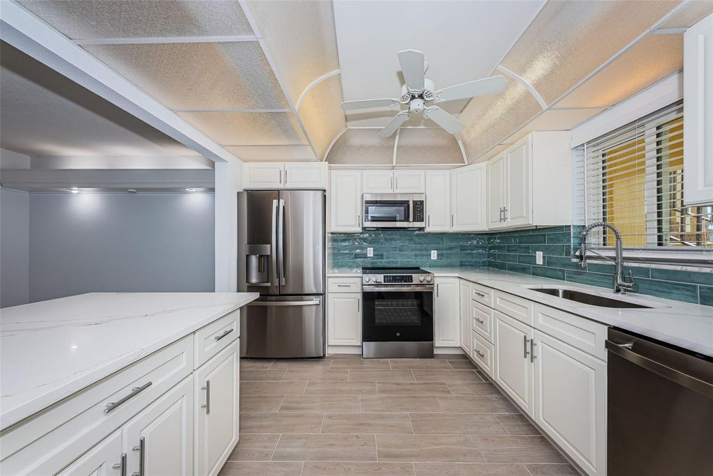 Photo of 4700 Cove Circle #110, St Petersburg, FL 33708 (MLS # TB8486463)