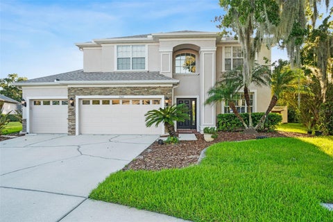 Photo of 27015 Firebush Drive, Wesley Chapel, FL 33544 (MLS # W7887950)