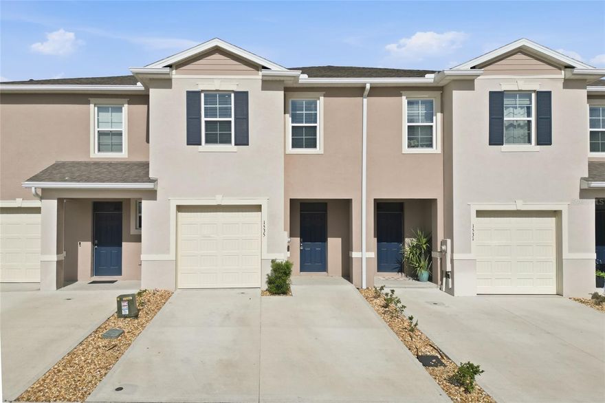 Why pay new construction prices for a bare-bones base model?
This beautifully upgraded 3-bedroom, 2.5-bath townhome in the sought-after Brentwood community gives you everything a new build charges extra for and it's ready now!  
The kitchen is outfitted with granite countertops, 42" cabinets, sleek stainless steel appliances, and a spacious walk-in pantry.
Upstairs, all three bedrooms are tucked away for privacy alongside two full bathrooms and a conveniently located laundry room with a brand-new washer and dryer already installed. No extra expense.
What makes this home stand out even in a brand-new community is the built-in smart home system. You can control your thermostat, locks, and garage door from your phone.
The low HOA fee here covers internet/cable and lawn care which means fewer bills, less hassle and more time to actually enjoy where you live.
Brentwood has resort-style amenities:  community pool, fitness center, and playground plus an unbeatable location with quick access to Hwy 27 and I-4, minutes from Posner Park's shopping and dining, top healthcare nearby, and a short drive to the energy of downtown Davenport.
New construction can mean months of waiting, a barren lot, and a punch list of upgrades to negotiate. This home is finished, landscaped and ready for you!