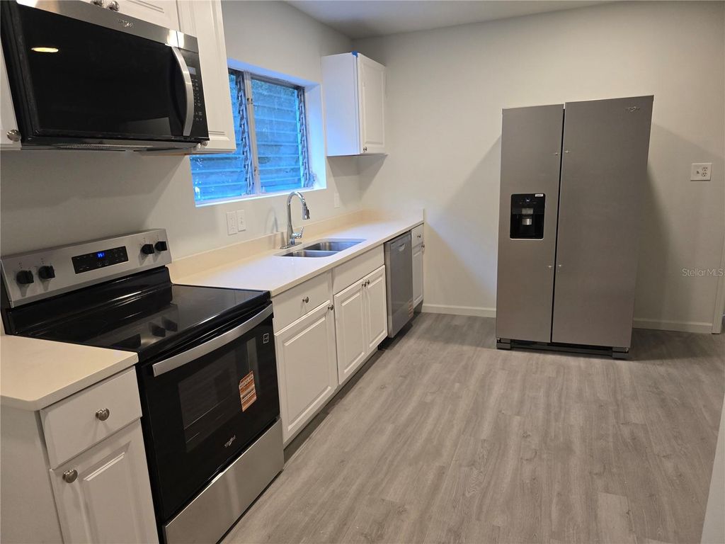 Photo of 610 Avenue A NE, Winter Haven, FL 33881 (MLS # O6379847)