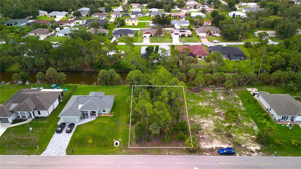 Photo of 256 Yorkshire Street, Port Charlotte, FL 33954 (MLS # C7511338)