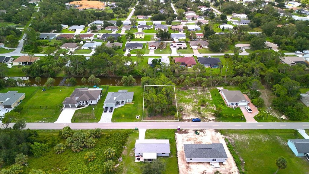 Photo of 256 Yorkshire Street, Port Charlotte, FL 33954 (MLS # C7511338)