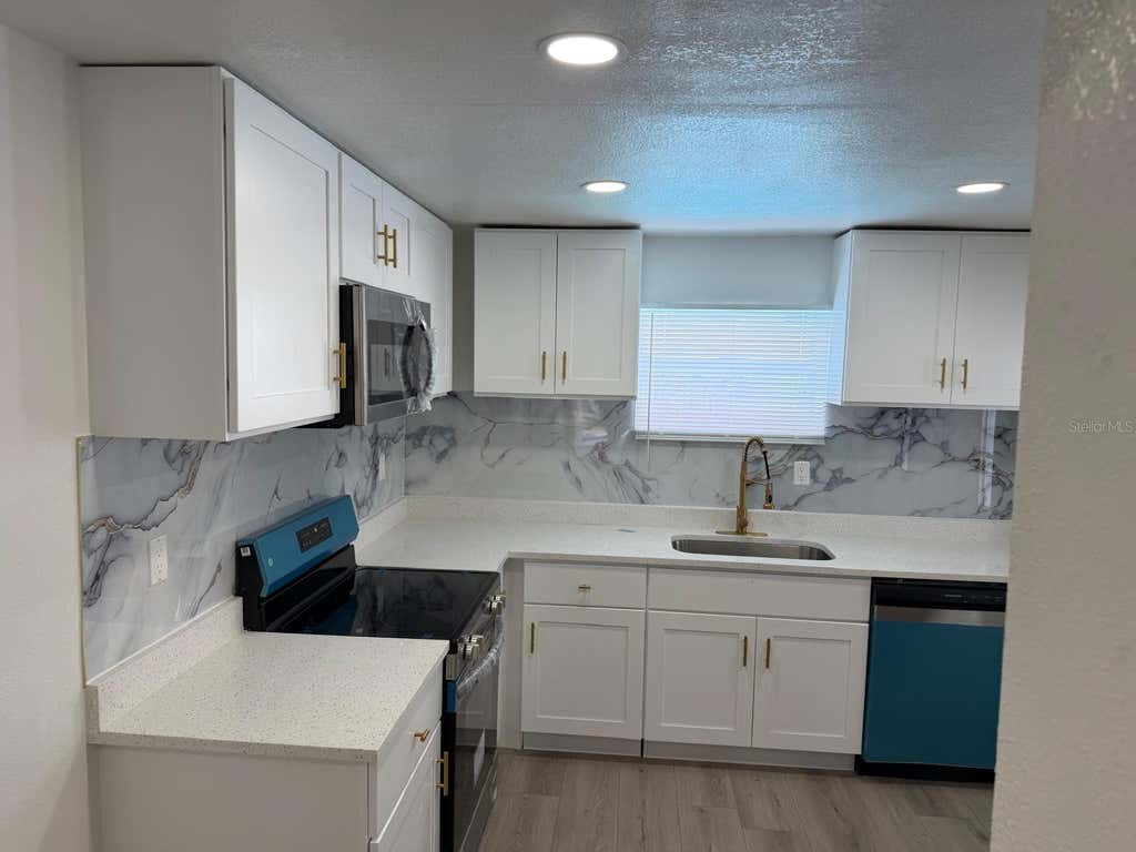 Photo of 4416 Cobia Drive, Tampa, FL 33617 (MLS # TB8534132)