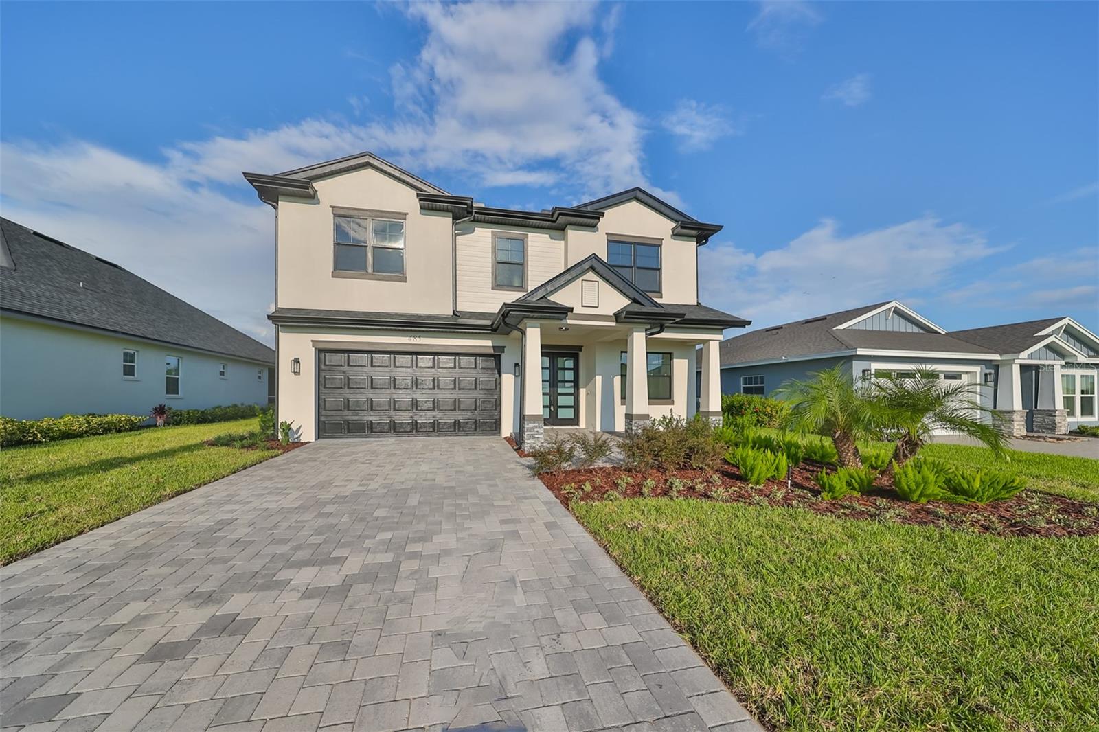 Brand-new construction. Welcome to your dream home located at 485 Adams View Lane in the Premier Gated Community of Water Ridge. This stunning property boasts 4 bedrooms, including a spacious master bedroom on the first floor for ultimate convenience. As you step inside, you'll immediately be drawn to the beautiful kitchen, which is perfect for entertaining or whipping up your favorite meals. The great room offers a cozy and inviting atmosphere, ideal for relaxing after a long day.
Doing laundry will be a breeze in the convenient and well-equipped laundry room. Need a quiet space to work from home? Look no further than the office, which provides a peaceful and productive environment. The mud room is perfect for storing all of your outdoor gear and keeping your home clean and organized.
As you make your way to the second floor, you'll find 3 spacious bedrooms, one of which is like a master bedroom. The flex room offers endless possibilities, whether you need a playroom for the kids or a home gym. But the real showstopper of this home is the breathtaking views that can be enjoyed from every room.
Step outside to the comfortable and inviting outdoor area, perfect for enjoying your morning coffee or hosting a summer barbecue. The house itself is filled with natural light, creating a warm and welcoming ambiance. The community itself provides great amenities such as multiple tennis and pickleball court complexes, 3 pools, boat ramps, access to all 3 lakes, gym facilities, boat/RV storage, community fishing docks and a beautiful clubhouse. It is conveniently located between Tampa and Orlando off the I-4. Close to Universal Studios, Disney Parks, Adams Estate, Shopping, Restaurants and much more! Agente habla español.