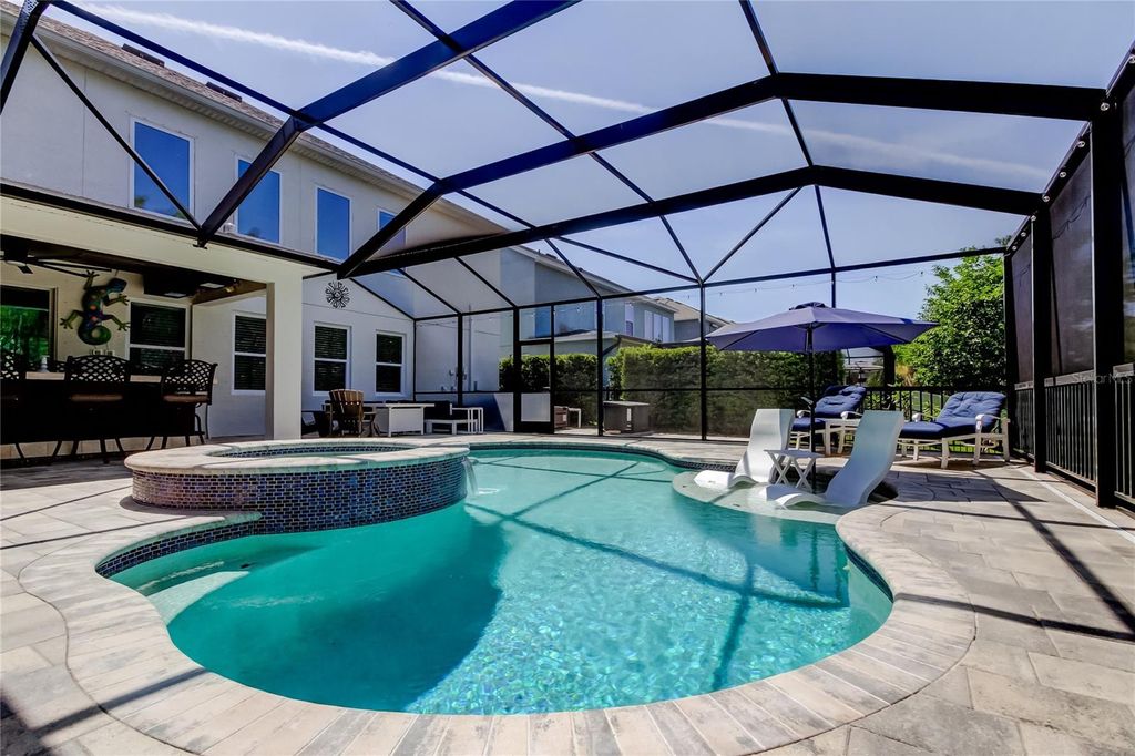Photo of 14975 Renaissance Ave, Odessa, FL 33556 (MLS # TB8378551)