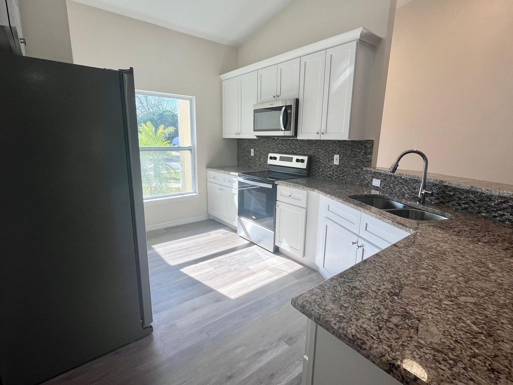 Photo of 925 Lora Street, Daytona Beach, FL 32114 (MLS # O6381780)