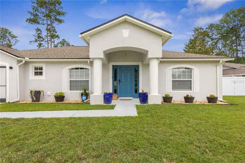 Photo of 64 Boston Lane, Palm Coast, FL 32137 (MLS # FC319207)