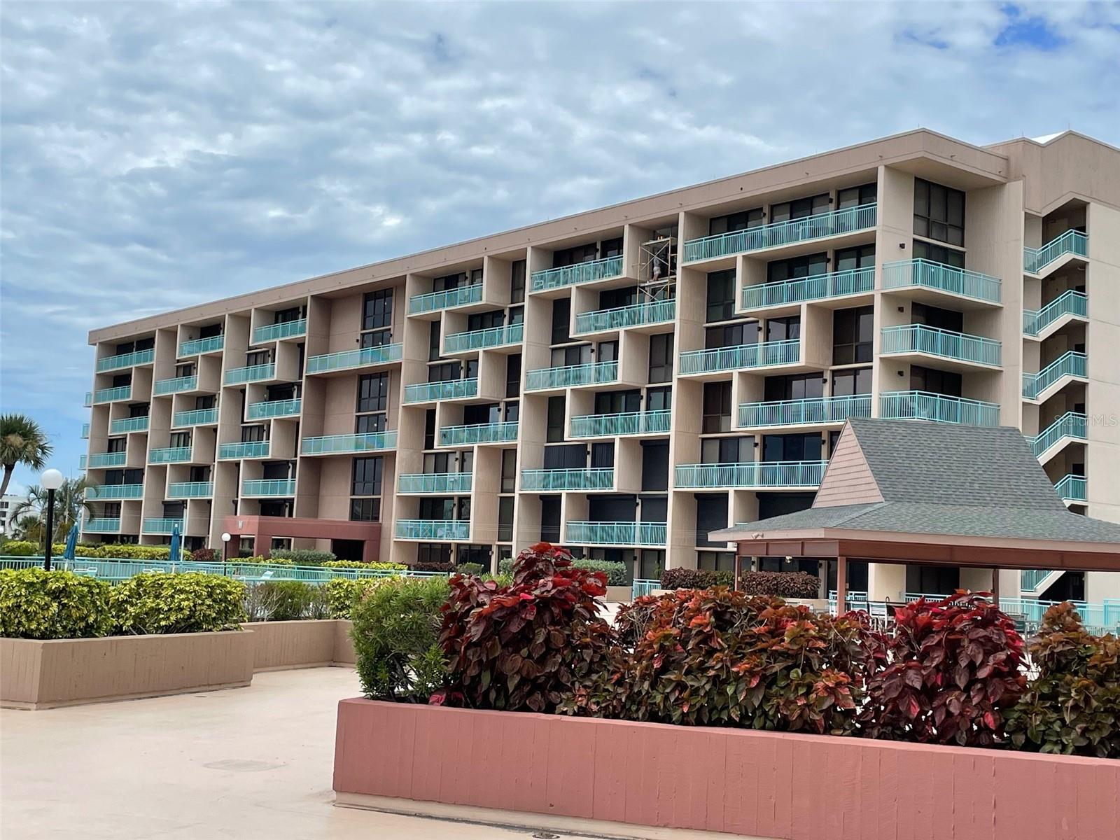 FULLY FURNISHED/TURN KEY, ANNUAL RENTAL! Come live the beach and island life at Treasure Island's only gated condo community located on Isle of Capri and the beautiful intercoastal waterway! This ground floor, 2 bedroom, 2 bath condo is offered fully furnished and turn key with one under building parking space and storage. Furnished in light, bright and clean styled furnishings. Everything down to towels, linens, kitchen supplies are included with this lovely condo with tile floors throughout. Enjoy sitting out on the large patio that is very private and stroll around the entire community for awesome water views! Take a dip in the pool, soak in the spa, use the outdoor picnic shelter, play tennis, shuffleboard, putt on the putting green or launch your kayak or paddleboard from the waterfront dock or throw a fishing line in the water! This unit has some very nice updates including an all in one laundry machine. Note, there is not a water view from the unit. The lease term is a minimum of 6 months but the owner prefers a year. Credit and background check required and approval & interview from the association. NO DOGS ALLOWED AT KEY CAPRI! Owner and building does allow cats. $2500/month includes all utilities, cable/internet, all amenities. Tenant only pays electric. This condo is clean and in excellent condition. Key Capri is a short drive, bike ride or walk to beautiful Treasure Island beach. See this condo today. First month last month and security deposit due with lease signing as well as application fees. 6 month lease possible at $2900/month.
