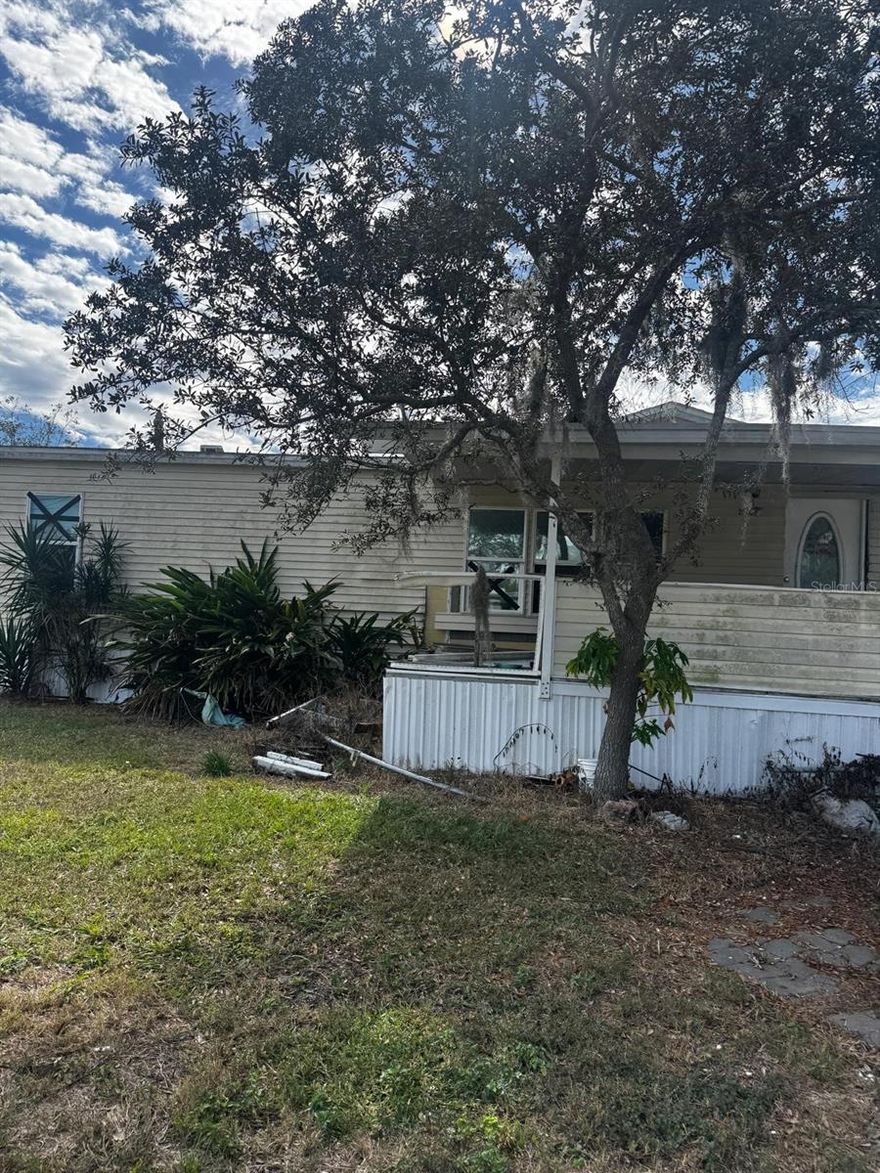 Discover the potential at 2626 Shine Dr in Lake Wales! This 3-bedroom, 2-bath double-wide manufactured home sits in a quiet, rural setting and is ready for a full transformation. The home requires extensive renovations throughout, making it an ideal project for investors, flippers, or buyers looking to create a customized space from the ground up. With a spacious floor plan and a generous lot, this property offers a solid foundation for your vision. Bring your crew, your creativity, and restore this fixer-upper into a great home or profitable investment.