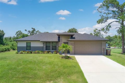 Photo of 703 Wellington Avenue, Lehigh Acres, FL 33972 (MLS # N6139698)
