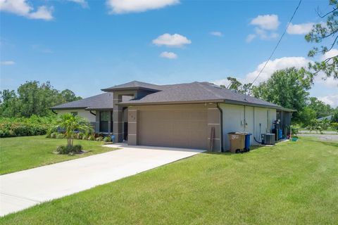 Photo of 703 Wellington Avenue, Lehigh Acres, FL 33972 (MLS # N6139698)