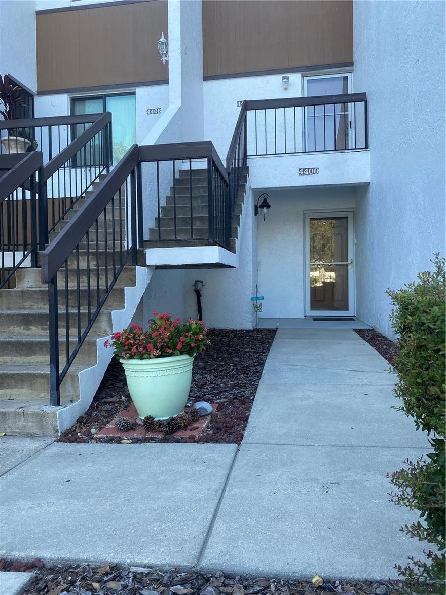 This spacious ground floor 3 bedroom 2 bathroom condominium is nestled in an ideal central location for a short commute anywhere in Orlando. An open floor plan with split bedrooms, makes it feel like a single family home. Updated with neutral colors, laminate & tile flooring, stone counter tops, modern fixtures, appliances and cabinets it is currently turnkey. There are additional  outdoor living  areas which include two screened in patios and a garden patio to relax and enjoy the beautiful Florida weather. Two reserved parking spaces are included as well as three storage rooms. The complex is surrounded by plenty of outdoor spaces, wildlife, mature trees, an open pet park and lakes. Welcome to maintenance free living! HOA fees include water, sewer, trash, building maintenance, grounds keeping, swimming pool, security gates & clubhouse use. The complex has brand new roofing & gutters. Shopping, entertainment & transportation is close by including Millenia & Florida Malls, Restaurants, Parks, Clubs, Theaters, I drive & Universal Studios. Schedule your showing today as this one will not last long!