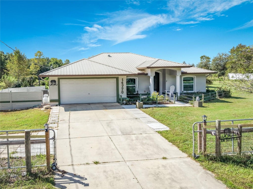 Photo of 14770 SW 30th Place, Ocala, FL 34481 (MLS # OM733070)