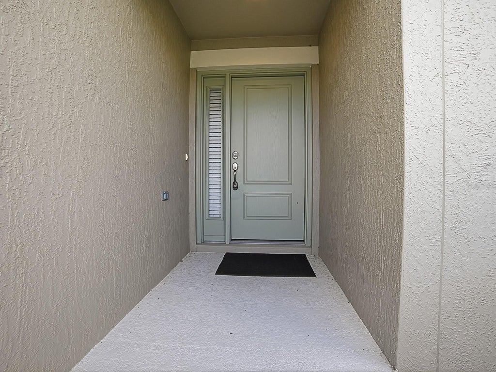Photo of 1896 Mcmurtrie Loop, The Villages, FL 34762 (MLS # G5113280)