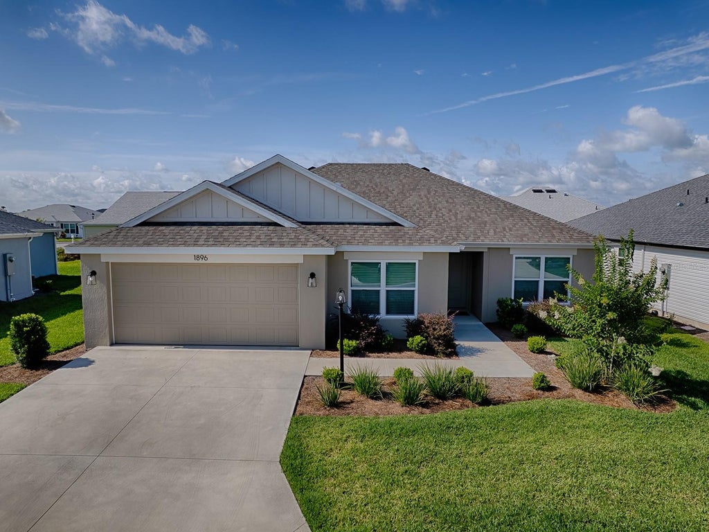 Photo of 1896 Mcmurtrie Loop, The Villages, FL 34762 (MLS # G5113280)