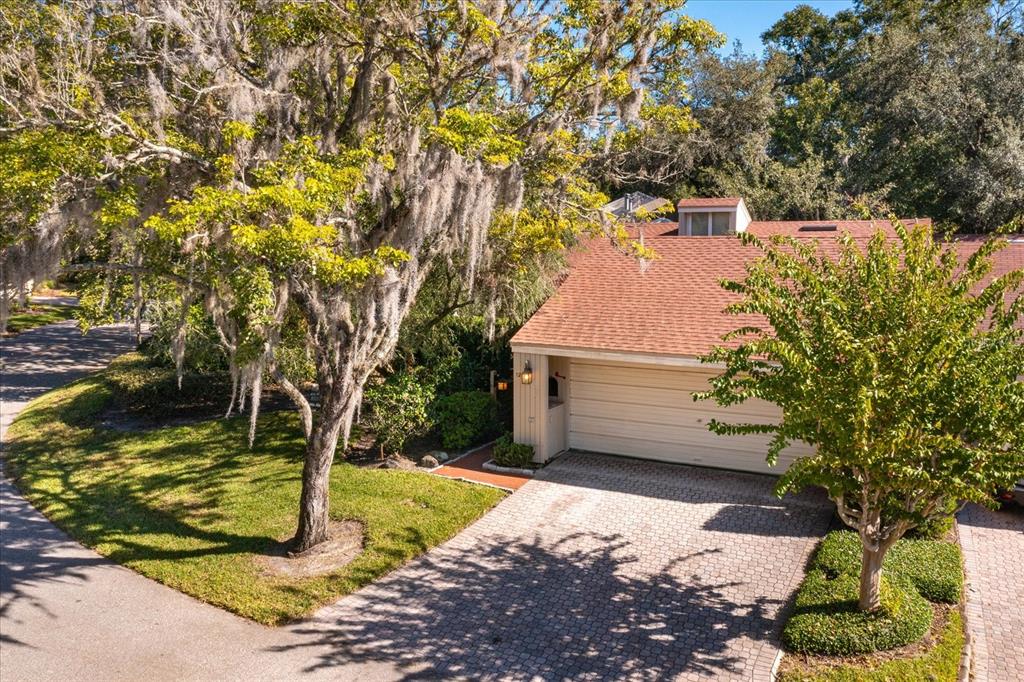 REDUCED & SELLER WILL PAY $5000 TOWARDS BUYER'S MORTGAGE BUYDOWN or CLOSING COSTS! Attention to Quality & Detail is evident throughout this home! Welcome to The Springs, a 24-hour Guard-Gated, highly sought-after Community! This beautiful home has 3-Bedrooms, 2-baths, & over 1900 sq. ft. It’s a Single Family Home with an open floor plan, within a Natural Spring Park setting. When you enter the foyer you’ll see light coming from all directions. Note the vaulted ceiling over the large Living & Dining room areas, and the stunning view of the 3-tier, lava rock waterfall outside! Fireplace is crafted of imported Golden Jade Onyx w/honed, buffed & polished edges. Above the mantle is a hand-carved Good Luck Lotus from Indonesia. Fireplace has an electric heater/blower. Dining room offers plenty of light from the sliding glass doors that lead to the private, fenced, patio. Family Room offers a wall of built-in, lighted, mirrored, custom-built cabinets above, and storage cabinets below. Kitchen features a granite island with a breakfast bar, glass stove cook-top & a high end vent fan. Custom-built Family Room & Kitchen cabinets are crafted of Canadian Red Birch, topped off with detailed large crown molding. Counters are high-end granite. Kitchen has a large, custom-built food pantry & plenty of storage drawers & cabinets. All GE Profile Performance Stainless Steel appliances stay. Sink wall features a hand-made 23k gold leaf Tree of Life with an Onyx stone imported frame. Kitchen flooring is Travertine. Rest of the home is Laminate flooring w/glued tongue & groove construction. The large Master Bedroom has a vaulted ceiling w/sliding doors to the private patio with a view of the waterfall & plants. The Master Bath has a roomy walk-in closet, large sink vanity area, & a Jacuzzi shower. Note the craftsmanship of the Spanish tile & the color coordinated decorator border tile and trim in both bathrooms. There’s Tile Ceilings in both the Master and Guest baths. Guest bath features the same Spanish tile & a marble sink. 2nd bedroom has a view of the garden & the 3rd bedroom has been used as an office w/custom cabinets & desk. The side courtyard has plenty of room for plants among the stone & rock decor features. Insulated windows with electric shades & the vaulted ceilings are double insulated. The oversized garage offers tons of cabinet space for storage & a newer garage door opener w/keypad. Water softener stays as well as the washer & dryer. A new roof was installed 4 years ago. Glenwood Village has a private pool a few doors down the street or short walk the other way, takes you to a bridge over the Little Wekiva River, & leads to The Springs Community area where you will marvel at the 72-degree, year-round, Natural Spring in an expansive park-like setting. Enjoy the beach, pontoon raft, picnic tables, grills, fish, turtles or an occasional otter. The Springs also has Tennis, Pickleball, Basketball Courts, Pool, Horse Stables, RV/Boat storage & Playground. A large Clubhouse is available for meetings, Party Rentals & on-site Community Manager’s office plus regularly planned social events. Close to I-4, Shopping, Hospitals, Dining, Grocery Stores. Some of the best Florida beaches are just a short drive away, camping, as well as all the world-famous Theme Parks. The Springs is approximately a 100-acre community with the Little Wekiva River running through it. Don’t be surprised if you see peacocks or deer! They love The Springs, too!