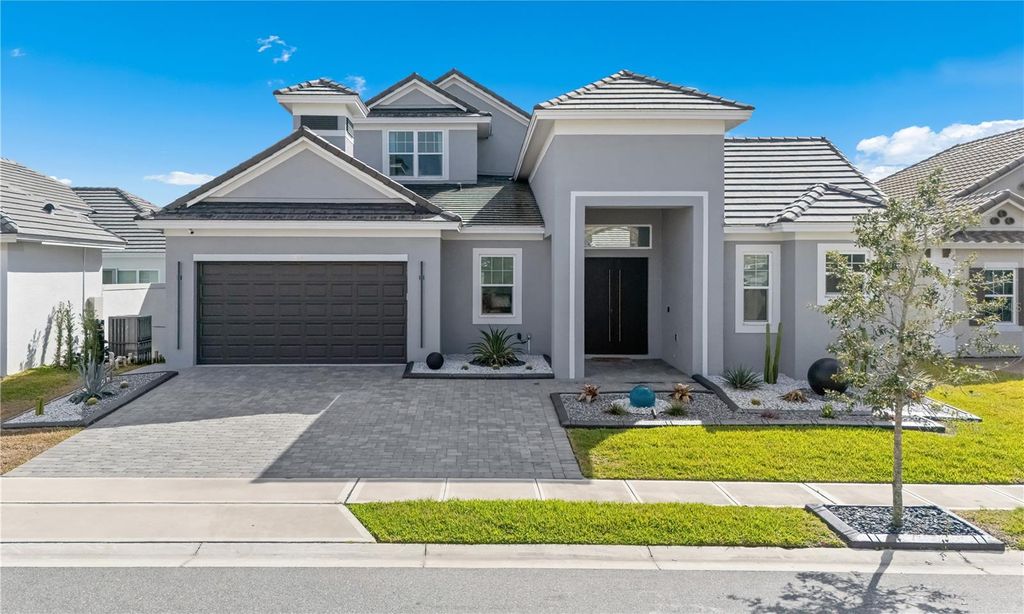 Photo of 239 Hampton Loop, Davenport, FL 33837 (MLS # S5145357)