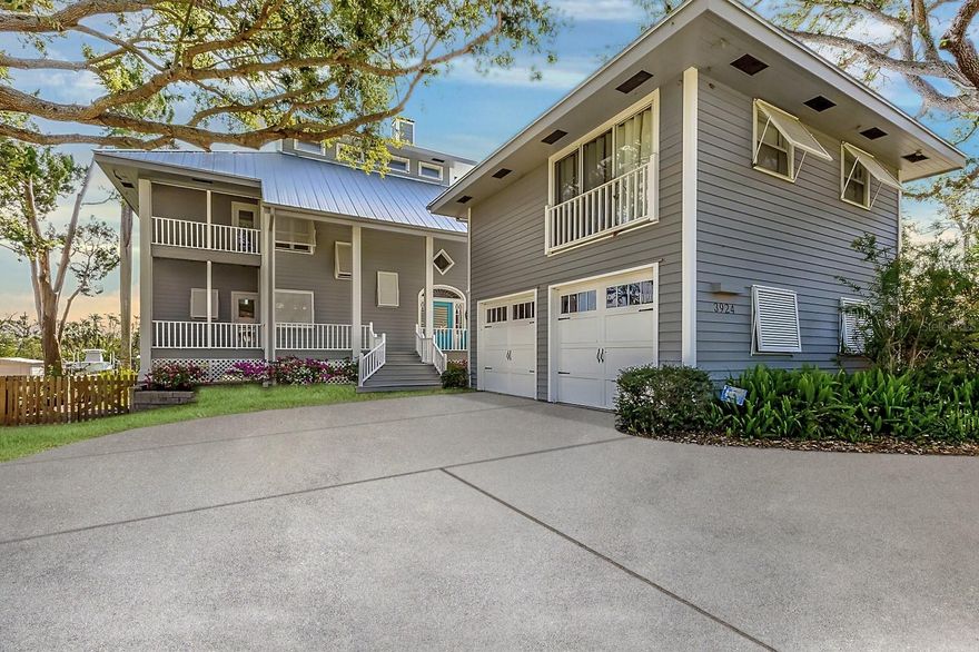 WELCOME TO AN EXTRAORDINARY WATERFRONT RESIDENCE ON RIVERVIEW BLVD!!! This home offers the ultimate Florida lifestyle with deep water AND no bridges to the Manatee River. This exceptional custom-built home boasts five bedrooms, five bathrooms,an office, bonus room, and an array of luxurious features designed for the most discerning buyer. Step inside to find volume ceilings throughout, creating an airy and open ambiance. The home is adorned with gleaming wood floors, an inviting wood-burning fireplace, and an abundance of natural light that fills the bright and open living and dining spaces. The gourmet kitchen is a chef’s dream, showcasing a six-burner Wolf range with a warming drawer, a Sub-Zero refrigerator, custom wood cabinetry, dual Fisher & Paykel dishwashers, stunning Soapstone countertops, and a large center island with a prep sink, offering both style and functionality. The main floor offers a convenient guest bedroom and a full bathroom, providing flexibility for family. Upstairs, the master suite is a private retreat featuring beautiful wood floors and captivating views of the Manatee River. The spa-like master bath is well-appointed with dual sinks, a walk-in shower, and a soaking tub, creating a perfect sanctuary. There are three additional bedrooms upstairs with two bathrooms, along with a versatile bonus room that could easily be converted into another bedroom. A spacious craft and laundry room offers endless possibilities and could be transformed to suit your needs. Above the two-car garage, a fully equipped IN-LAW suite provides privacy and comfort, complete with a kitchenette, living area/bedroom, and full bath—ideal for extended family or visitors. This home embraces the essence of indoor-outdoor living with porches extending from nearly every living space, including the bedrooms, allowing you to soak in the stunning river views from every angle. The newly installed metal roof and brand-new dock enhance the property’s appeal and offer peace of mind for years to come. Situated in a prime location, this home is just minutes away from top-rated schools, including Saint Stephen’s School, Bradenton Christian School, and IMG Academy. The beautiful Gulf beaches of Anna Maria Island are also within easy reach, offering the perfect blend of convenience and coastal charm. Whether you prefer to relax while watching manatees swim in McLewis Bayou or enjoy fishing off your private dock, this home provides an unparalleled lifestyle. Don’t miss the opportunity to own this incredible home where luxury meets the tranquility of waterfront living. Schedule your private showing today!