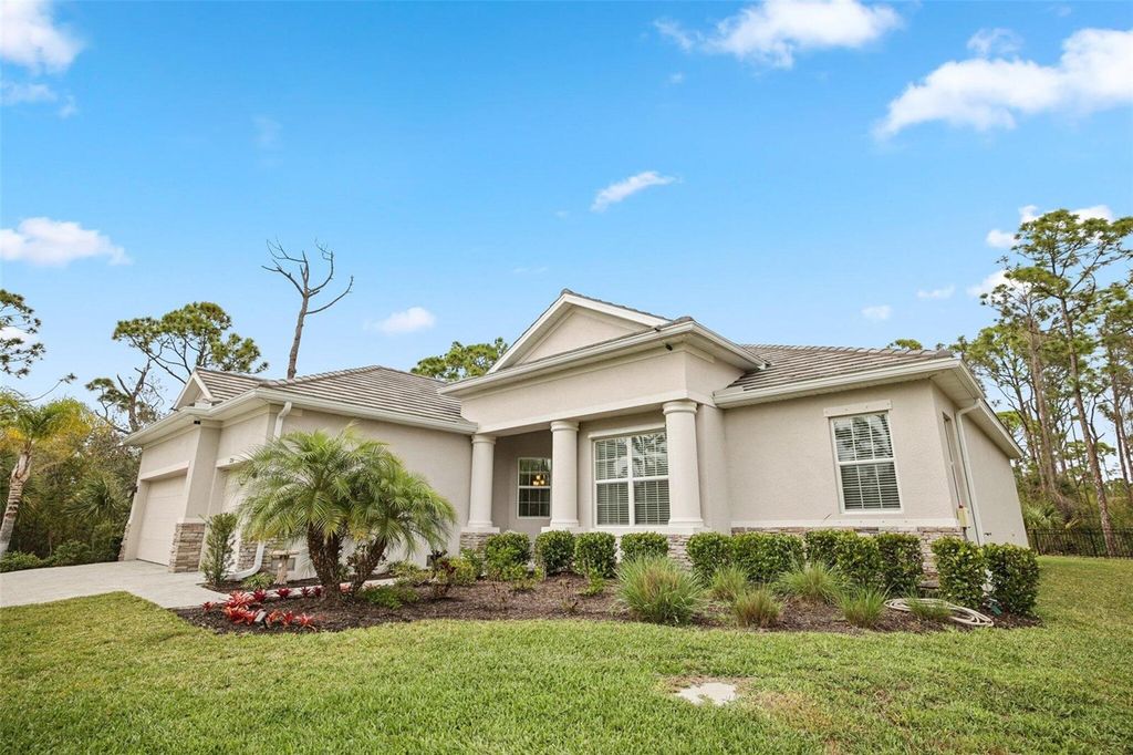 Photo of 8266 Matecumbe Road, Port Charlotte, FL 33981 (MLS # O6390545)