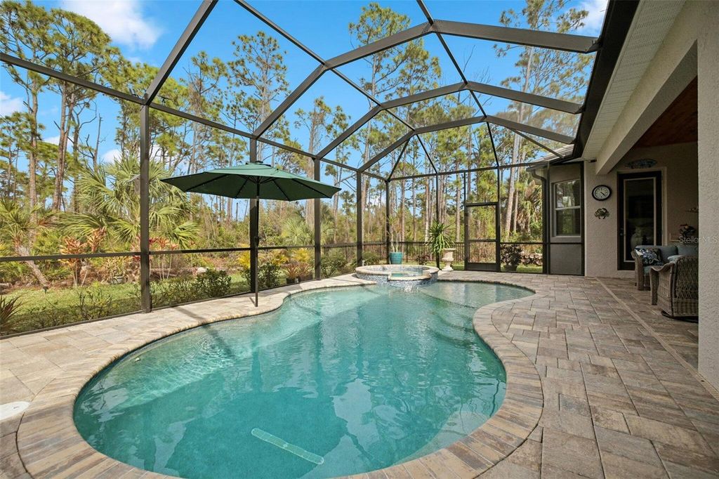 Photo of 8266 Matecumbe Road, Port Charlotte, FL 33981 (MLS # O6390545)