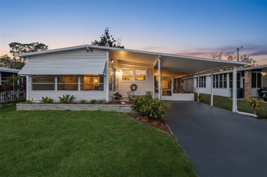 Photo of 120 La Costa, North Port, FL 34287 (MLS # TB8478117)