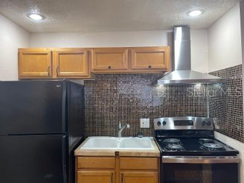 Photo of 9105 W Hillsborough Avenue #I104, Tampa, FL 33615 (MLS # TB8486129)