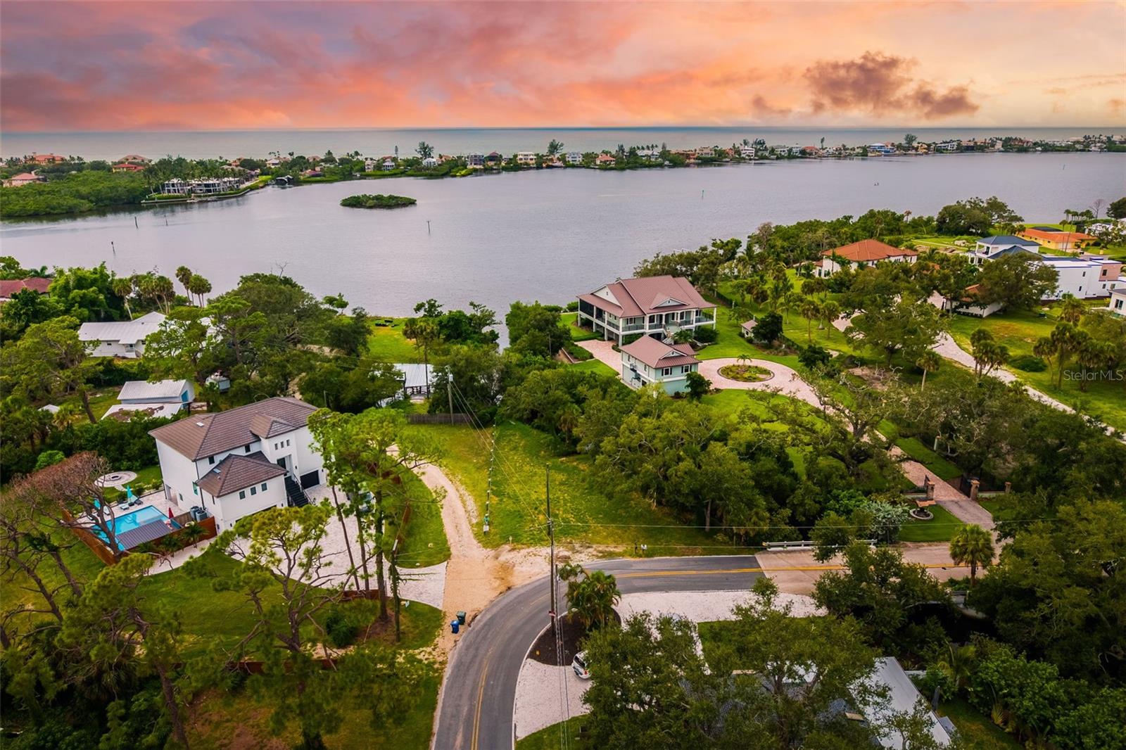 Waterfront Lot with no fixed bridges out and direct access to the intercoastal of Blackburn Bay. Surrounded by multi million dollar homes. Boat ramp located on the property. The prime location offers easy access to both Sarasota and Venice, granting you the opportunity to experience the best of Southwest Florida's beaches. Whether you prefer the pristine shores of Venice or Nokomis, or the world-renowned Siesta Key Beach, all are within a short drive.