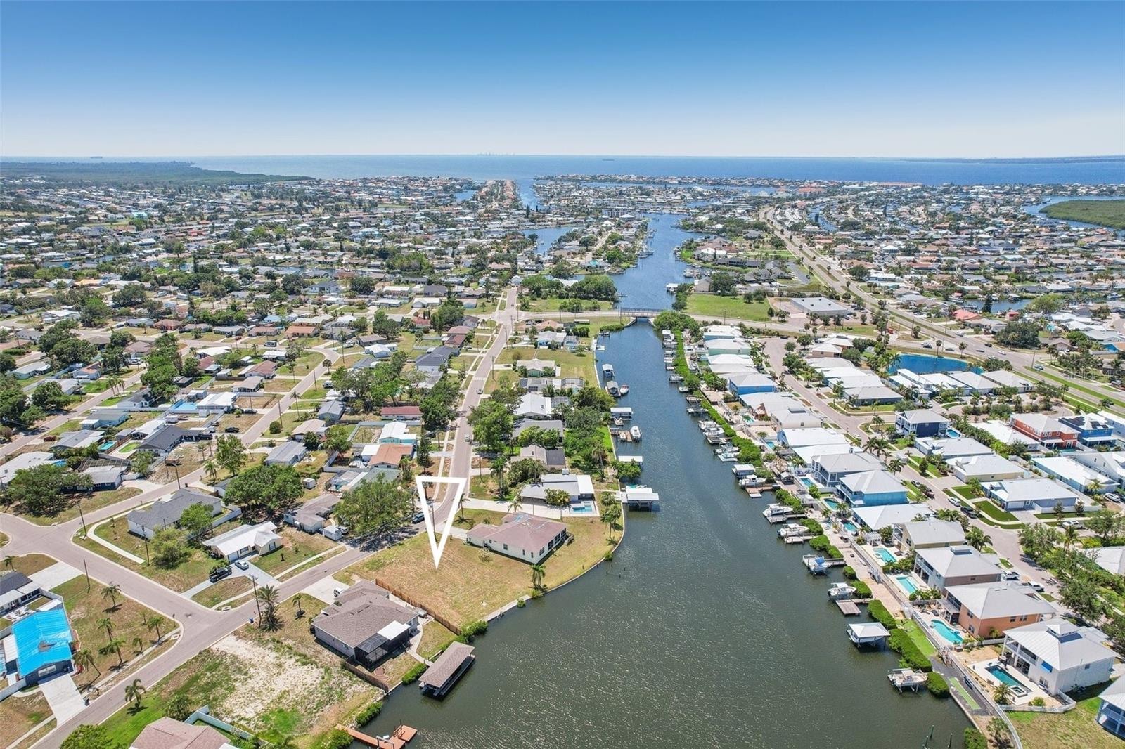 Exceptional Gulf Access Location! Discover the perfect opportunity to build your dream Gulf-access waterfront home on this premium canal-front lot in Apollo Beach, Florida. Nestled in a vibrant coastal community in Hillsborough County, Apollo Beach is known for its stunning views, deep-water canals, and direct access to the Gulf of Mexico. From festive boat and golf cart parades to laid-back beach days at the local nature preserve, this community offers the ideal blend of excitement and relaxation.
This prime lot provides deep water access, allowing you to dock your boat right in your backyard—no marina or storage fees required. Spend your days fishing, kayaking, paddleboarding, or cruising the waterways. When hunger strikes, hop in your boat and head to popular waterfront dining spots like The Preserve, Circles, or Finns—all just minutes away by water.
With no HOA or CDD fees, you're free to design the lifestyle you want without unnecessary restrictions. Surrounded by parks, nature trails, golf courses, and endless outdoor recreation, Apollo Beach offers a rare chance to live the ultimate Florida coastal lifestyle. Don’t miss your chance to create unforgettable memories in one of Tampa Bay’s most desirable waterfront communities.