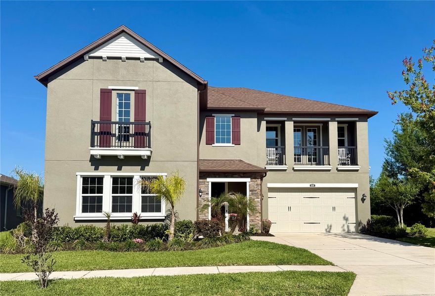 This stunning 5-bedroom, 4-bath residence within the gated enclave of Meridian, is situated on a private homesite with expansive conservation on three sides. This Cal-Atlantic built home (Chesapeake model, European Cottage elevation) features elegant stone accents, professionally upgraded landscaping, and a spacious three-car garage complete with epoxy flooring. Step inside to a grand and inviting foyer highlighted by a stunning wrought iron staircase and chandelier that sets the tone for the home’s elegant design. The unique floor plan provides beauty along with functionality and flexibility, including a custom-built stone, gas fireplace with custom cabinets and bookcases in the family room, first floor bedroom with full bath and walk-in shower, private office or den with double doors, formal dining room with tray ceiling, and an additional game or media room, along with it’s own balcony. The gourmet kitchen is a true centerpiece, appointed with a massive granite island, butler’s pantry with beverage bar, double oven, double stainless steel sink, spacious pantry, and a large, open dining area. Off the kitchen, excellent for indoor and outdoor entertaining, is an immense fully-screened lanai with a conservation view where you will enjoy watching deer, and otters play. Upstairs, the luxurious owner’s suite provides a private retreat with wood flooring and a tray ceiling, featuring a screened-in balcony, an oversized walk-in closet, a spa-inspired bath with soaking tub, vast glass shower with additional rain shower-head, and dual granite vanities. Residents of Meridian enjoy access to resort-style amenities, including a clubhouse where rooms can be reserved for social gatherings, large pool with lap lanes and splash pad, fitness center, playground, tennis and pickleball courts, basketball courts, scenic park with grill and more. Conveniently located just minutes from premier shopping and dining, with easy access to I-75, downtown Tampa, and Tampa International Airport, this home is the ultimate blend of luxury, comfort, and convenience.