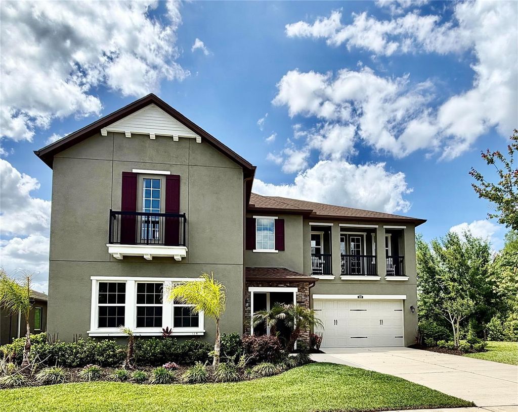 Photo of 1879 Whitewillow Drive, Wesley Chapel, FL 33543 (MLS # O6399021)