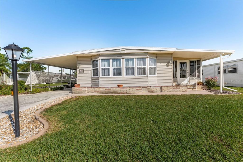 Photo of 406 Chiquita, North Port, FL 34287 (MLS # TB8434160)