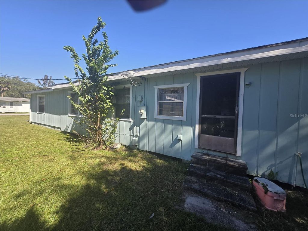 Photo of 171 N Putnam Grove Road, Oak Hill, FL 32759 (MLS # TB8478946)