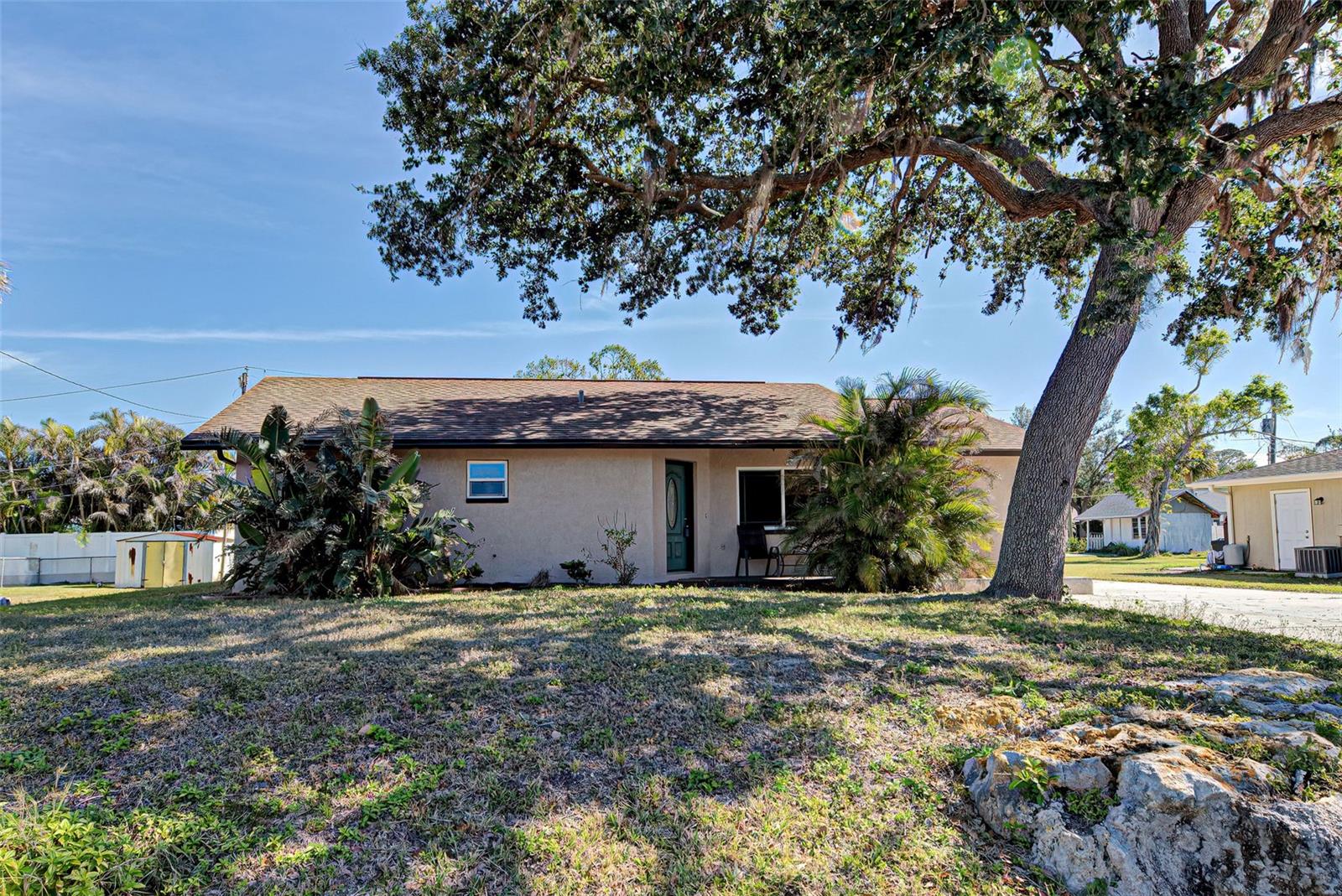 Welcome to this beautifully updated home featuring 3 bedrooms and 2 full baths. Step inside and admire the bright layout with vaulted ceilings and luxury vinyl plank flooring throughout, offering both style and durability. The split floor plan ensures privacy, with the luxurious primary suite offering French doors that lead to a serene retreat. The master bath is a spa-like oasis, complete with a jacuzzi tub, touch-activated fog-free mirrors, dual vanities, and plenty of space to unwind. The guest bathroom also has a Jacuzzi tub and a spacious layout. For peace of mind the big items have been taken care of and include an updated kitchen, the Roof was installed in 2021, Water Heater and AC installed in 2022 and an Impact-resistant front window for added safety during storms. Enjoy the Extra-large parking pad ideal for your RV or boat, with an outlet for RV hook-up. Enjoy the Florida room filled with natural light and extra space to relax. The backyard has a shed for storage and there is space to add a pool, making it ideal for creating your outdoor oasis. Don’t miss this opportunity to own a beautifully updated home in a fantastic location just 5 miles to Venice Beach and close to shopping, golf and many restaurants. Schedule your showing today and make 3187 Galiot Rd your own!